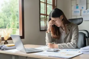 Upset woman on a laptop